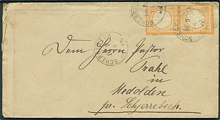 ½ gr. Stort Brystskjold i lodret parstykke på lokalt brev annulleret med enringsstempel Scherrebeck d. 10.9.1874 til Medolden pr. Scherrebeck.