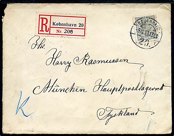 50 øre Chr. X på anbefalet brev fra København d. 9.12.1931 til Hauptpostlagernd München, Tyskland. På bagsiden Julemærke 1931.