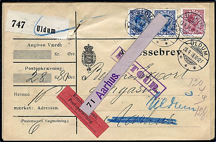20 øre (par) og 50 øre Chr. X på 90 øre frankeret adressebrev for pakke med opkrævning fra Uldum d. 26.4.1918 til Aarhus. Retur som ej indløst med vedhængende postopkrævningsblanket.