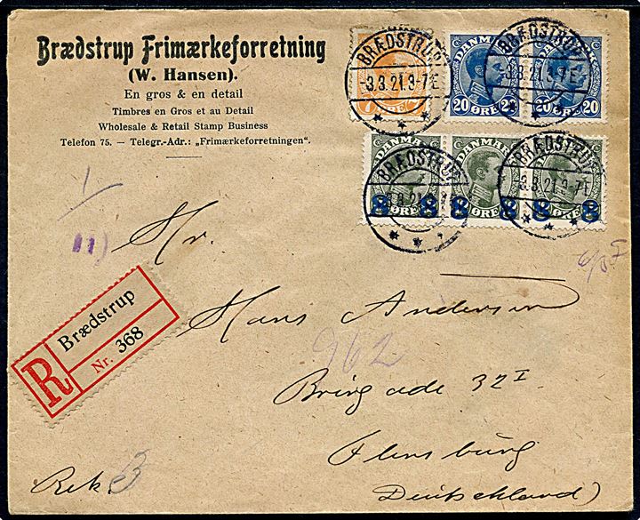 7 øre, 20 øre (par) Chr. X og 8/12 øre Provisorium (3-stribe) på anbefalet brev fra Brædstrup Frimærkeforretning d. 3.3.1921 til Flensburg, Tyskland. Åbnet af tysk toldkontrol.