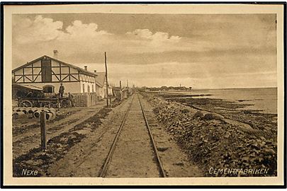 Neksø. Cementfarikken med jernbane sporet. F. Sørensen no. 2659.