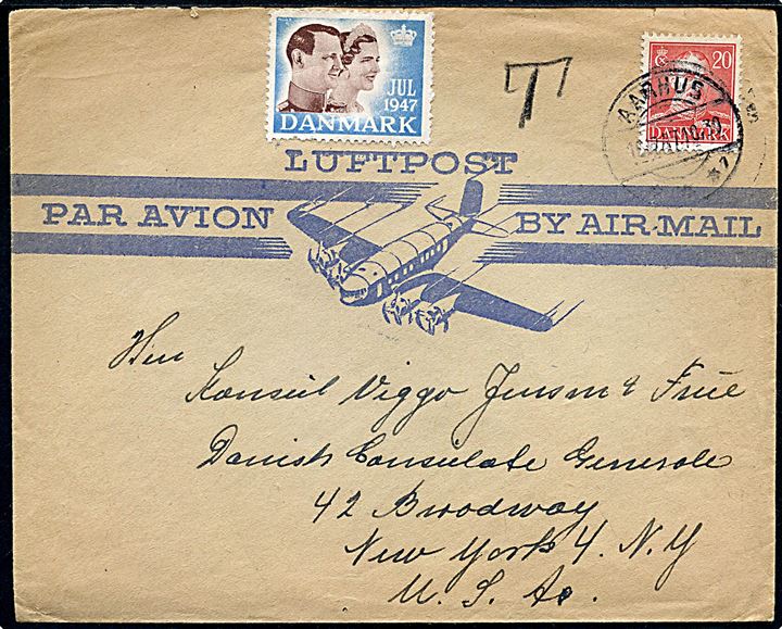 20 øre Chr. X og Julemærke 1947 på luftpostkuvert fra Aarhus d. 16.12.1947 til Danske General Konsulat i New York, USA. Påstreket T - men ellers ikker behandlet som underfrankeret portobrev.