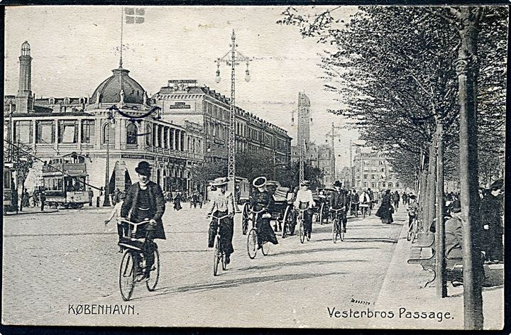Vesterbros Passage med cyklister. I baggrunden Grand Hotel National og sporvogn no. 23. Stenders no. 6088. Kvalitet 8