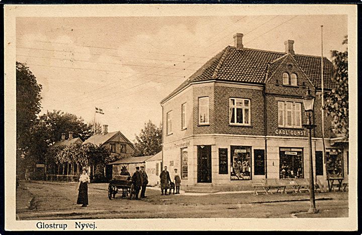 Glostrup, Stationsvej 22 hj. Nyvej med Købmand Carl Gunst. Glostrup Papirhandel u/no. Kvalitet 8