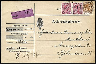 50 øre (2) og 1 kr. Chr. X på 2 kr. frankeret adressebrev for værdipakke fra Rønne d. 24.12.1917 til Kjøbenhavn.