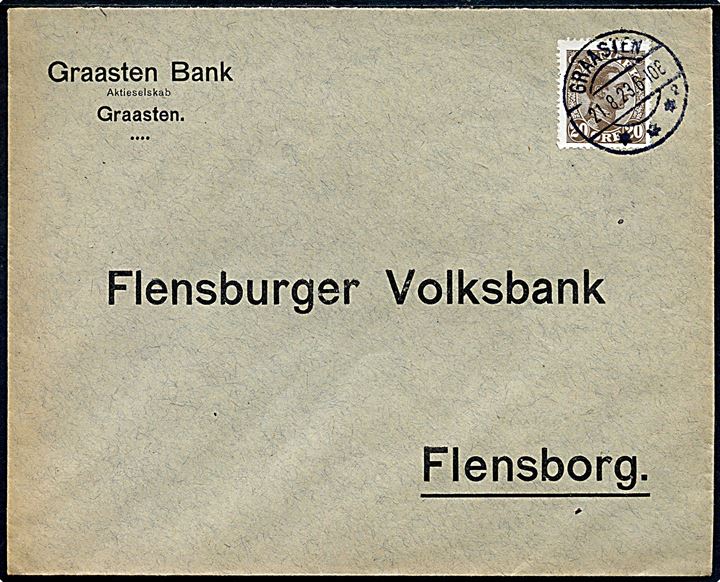 20 øre Chr. X på fortrykt kuvert fra Graasten Bank frankeret som GRÆNESPORTO med brotype IIb Graasten sn2 d. 21.8.1923 til Flensburg, Tyskland.