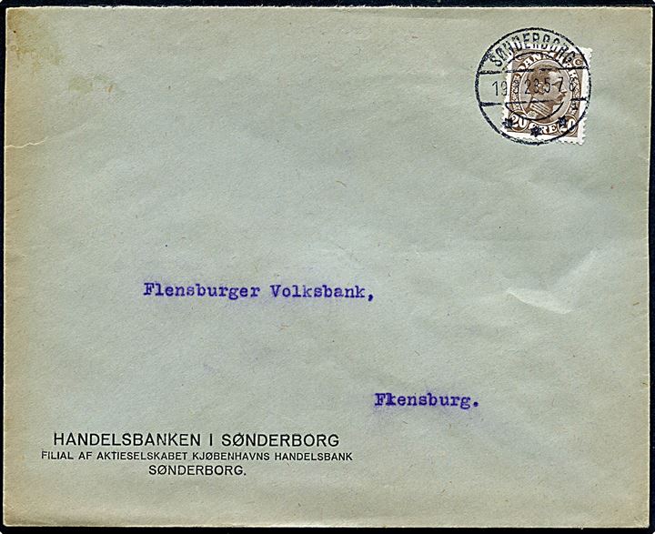 20 øre Chr. X på fortrykt kuvert frankeret til GRÆNSEPORTO fra Handelsbanken i Sønderborg annulleret med brotype IIb Sønderborg sn1 d. 19.3.1923 til Flensburg, Tyskland.