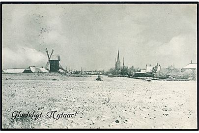 Nakskov, udsigt med kirke og mølle i sne. Nytårskort. Stenders no. 20687.