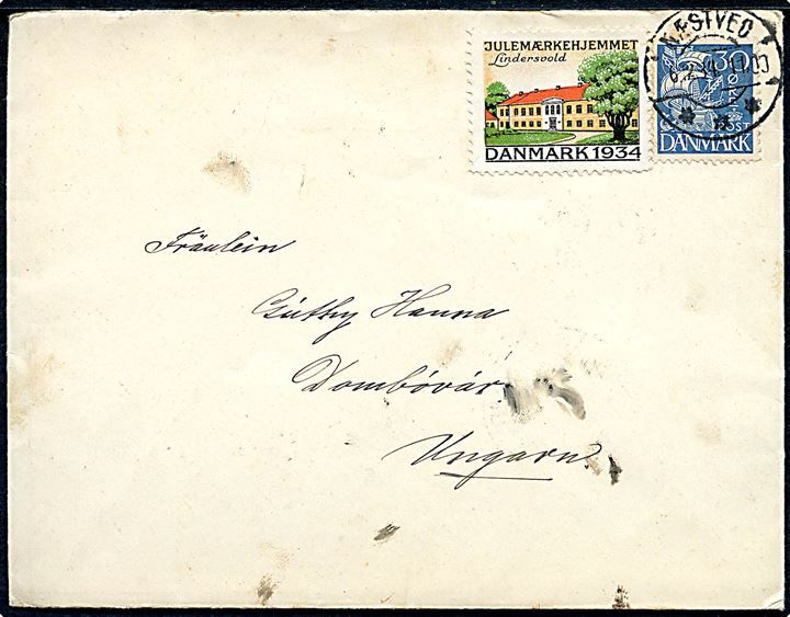 30 øre Karavel og Julemærke 1934 på brev fra Næstved d. 6.12.1934 til Dombóvár, Ungarn. På bagsiden ank.stemplet i Dombóvár d. 9.12.1934. God destination.