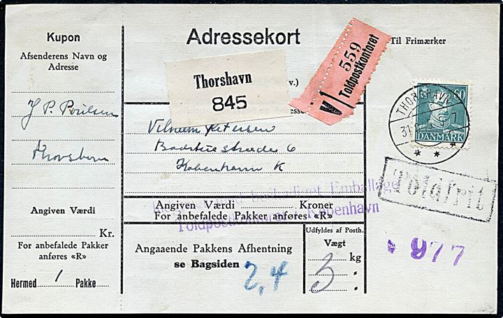 60 øre Chr. X på adressekort for pakke med fortrykt britisk pakkeetiket Thorshavn no. 845 (små tal) fra Thorshavn d. 31.8.1945 til København. Svagt violet stempel vedr. beskadiget emballage. GF10: 5.000,-
