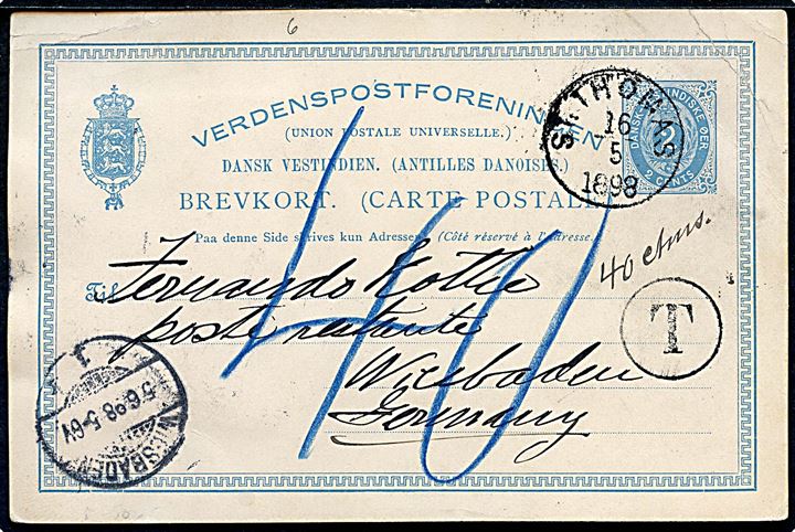 2 cents helsagsbrevkort udtakseret i porto med påklæbet fotografi (St. Thomas havn) fra St: Thomas d. 16.5.1898 til Wiesbaden, Tyskland. Sort “T”-stempel og påskrevet “40 ctms” og tysk “40” pfg. porto.