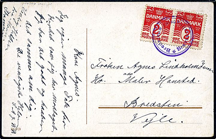 2 øre Bølgelinie i parstykke på lokalt brevkort annulleret med privat violet stempel “Bredsten*Brevsamlingssted*” ca. 1911-13. Forløber for stjernestempel bestilt i 1915. Et mærke med fold. 