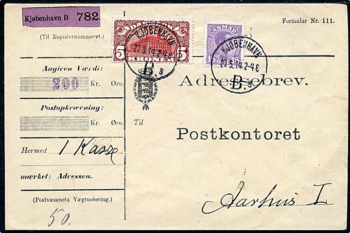 15 øre Chr. X og 5 kr. Posthus på adressebrev for pakke med værdi: 200 kr. fra Kjøbenhavn B. d. 20.5.1914 til postkontoret i Aarhus. 