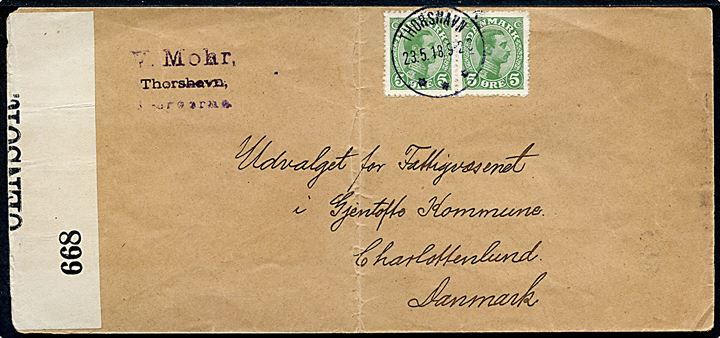 5 øre Chr. X i vandret parstykke på aflangt brev fra Thorshavn d. 23.5.1918 til Charlottenlund, Danmark. Åbnet af britisk censur banderole Opened by Censor 668. Lodret fold. 