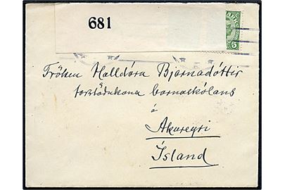 5 øre Chr. X i vandret parstykke på brev fra Kjøbenhavn d. 22.2.1918 til Akyreyri, Island. Åbnet af britisk censur med banderole Opened by Censor 681 og ank.stemplet i Akureyri d. 24.5.1918.