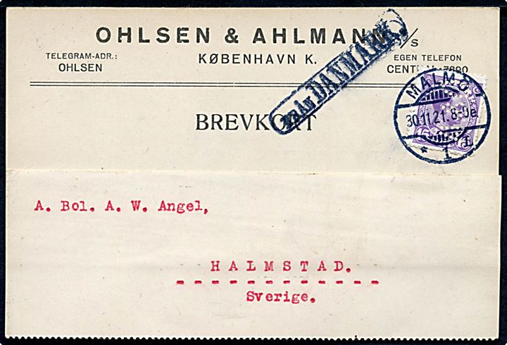 15 øre Chr. X med perfin O&A på brevkort fra firma Ohlsen & Ahlmann A/S i København annulleret med svensk stempel i Malmö d. 30.11.1921 og sidestemplet Från Danmark til Halmstad, Sverige.