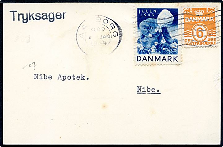 6 øre Bølgelinie og Julemærke 1943 på Julekort sendt som tryksag fra Aalborg d. 4.1.1944 til Nibe.
