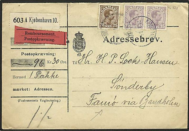 15 øre (parstykke) og 25 øre Chr. X på adressebrev for pakke med opkrævning fra Kjøbenhavn d. 20.9.1918 til Sønderby på Fæmø pr. Bandholm.