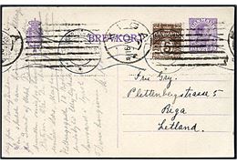 15 øre Chr. X helsagsbrevkort (fabr. 65-H) opfrankeret med 5 øre Bølgelinie fra København d. 12.6.1922 til Riga, Letland.