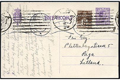 15 øre Chr. X helsagsbrevkort (fabr. 65-H) opfrankeret med 5 øre Bølgelinie fra København d. 12.6.1922 til Riga, Letland.