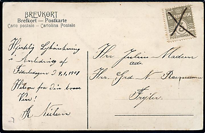 3 øre Bølgelinie på lokalt brevkort i anledning af fødselsdag d. 9.1.1908 annulleret med kryds til Frejlev.