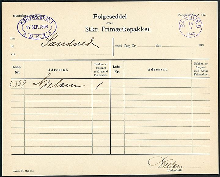Statsbanedriften Følgeseddel for Frimærkepakke med violet ovalt stempel KBHVNS.BY.ST.1. * D.S.B. d. 17.9.1898 til Sandved. Ank.stemplet med violet lapidar VI Sandved d. 18.9.1898.
