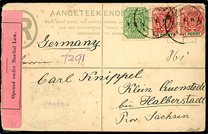 4d. V.R.I. anbefalet helsagskuvert opfrankeret med ½d V.R.I. (2) og 1d E.R.I. (4) fra Johannesburg d. 17.4.1901 til Halberstadt, Tyskland. Åbnet af boerkrigs-censur med rød banderole og ovalt stempel fra Johannesburg d. 17.4.1901. Skramme på bagsiden.