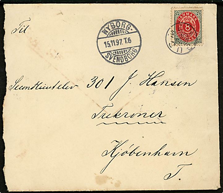 8 øre Tofarvet på brev annulleret med stjernestempel GUDME og sidestemplet bureau Nyborg - Svendborg T.6 d. 15.11.1897 til soldat på søfortet Trekroner ved København. Urent åbnet i venstre side.