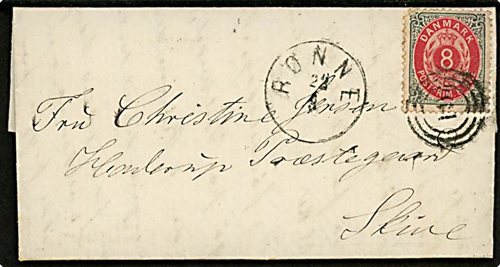 8 øre Tofarvet på brev annulleret med nr.stempel 61 og sidestemplet lapidar Rønne d. 22.3.1883 via Kjøbenhavn til Skive.
