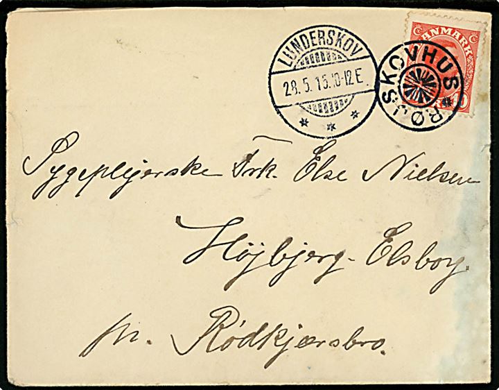 10 øre Chr. X på brev annulleret med stjernestempel RØJSKOVHUS og sidestemplet Lunderskov d. 28.5.1915 til Rødkjærsbro.