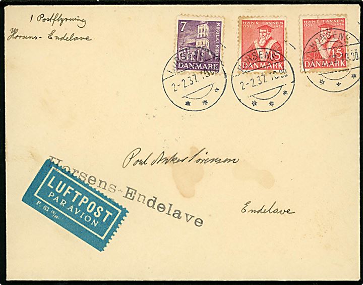 7 øre Nikolai kirke og 15 øre Tavsen (2) på filatelistisk isluftpost brev fra Horsens d. 2.2.1937 til Endelave. På bagsiden udslebet stjernestempel Endelave.