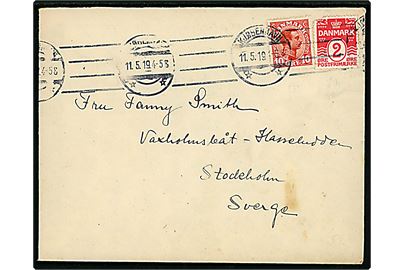 2 øre Bølgelinie og 10 øre Chr. X på 12 øre frankeret skærgårds skibsbrev fra Kjøbenhavn d. 11.5.1919 til Hasseludden via Vaxholmbåt, Stockholm, Sverige.
