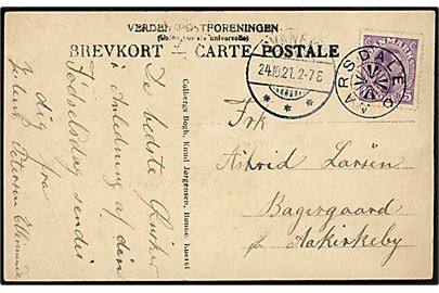 15 øre Chr. X på brevkort (Kongemindet i Almindingen) annulleret med stjernestempel AARSDALE og sidestemplet Svaneke d. 24.10.1921 til Aakirkeby.