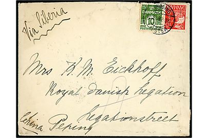 10 øre Bølgelinie og 15 øre Karavel på brev påskrevet via Sibiria fra Nykøbing Falster d. 15.3.1929 til Peking, Kina. Bagklap revet.