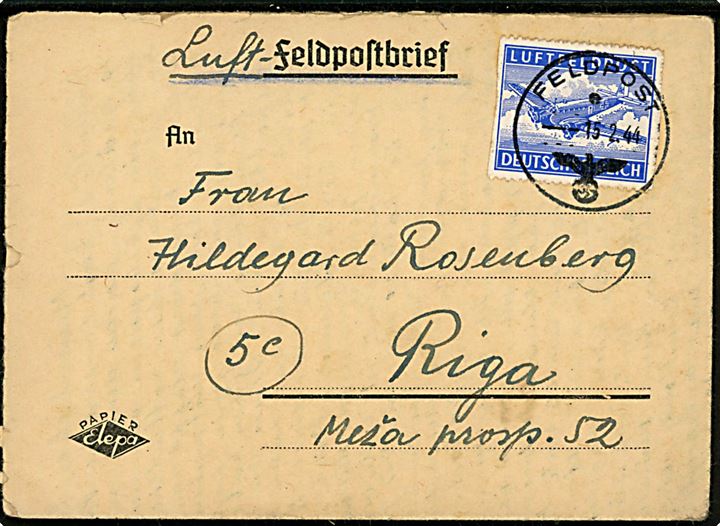 Luftfeldpost mærke på Feltpost korrespondancekort sendt som luftfeldpost stemplet Feldpost d. 15.2.1944 til Riga, Letland. Interessant brug af Postleitzahl 5c for Letland. Sendt fra soldat ved feldpost no. 07725 = Feldpostamt 519.