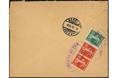 Schweiz 10 c. på brev fra Chemins de fer de l'est annulleret Boncourt d. 8.12.1915 til Basel. På bagsiden fransk 5 c. og 10 c. (par) annulleret med ovalt toldstempel fra Delle. 