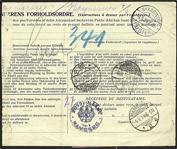 20 øre (2) ogt 1 kr. (2) Chr. X på internationalt adressekort for pakke med opkrævning fra Nakskov d. 4.5.1924 til Hamburg, Tyskland. Klippet i venstre side.