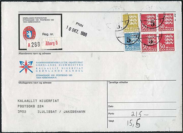 5 kr., 10 kr. og 50 kr. (4) Rigsvåben på GRØNLANDSK adressekort for pakke anvendt i Danmark og stemplet København d. 7.10.1988 til Jakobshavn, Grønland.