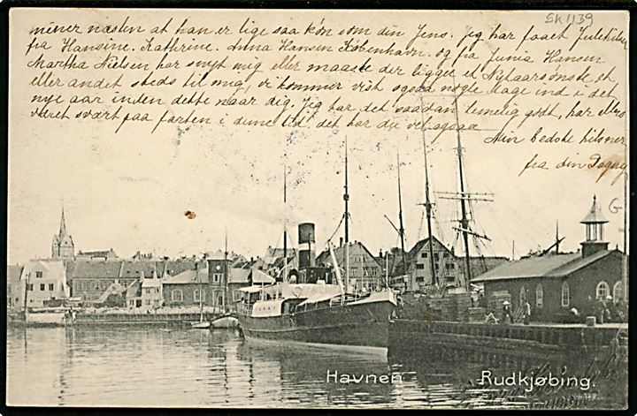 5 øre Chr. IX på brevkort (Rudkjøbing havn med dampskib) annulleret med stjernestempel SIMMERBØLLE og sidestemplet Rudkjøbing d. 31.12.1906 til Østerby på Samsø.