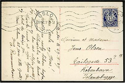 15 øre Posthorn med perfin S.B. på brevkort (Oslo, Storetorv med sporvogn) fra Oslo d. 29.8.1927 til København, Danmark.