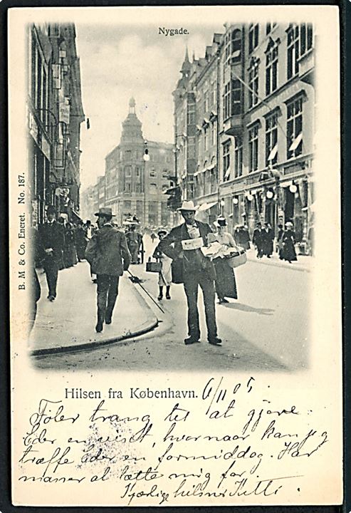 Nygade, med avissælger. “Hilsen fra København”. B. M. & Co no. 187. Kvalitet 8