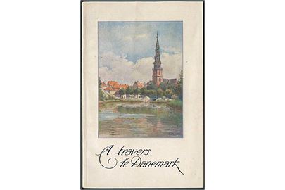 Fransk sproget turist hæfte A travers le Danemark udgivet af Den danske Turistforening ca. 1910. Illustreret med 34 sider og landkort.