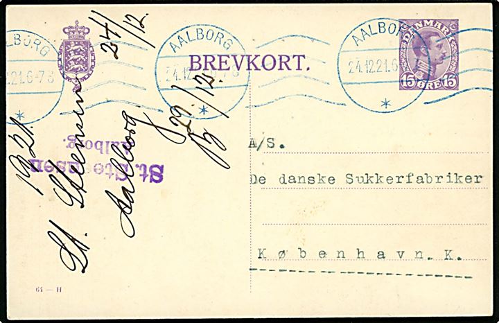 15 øre Chr. X helsagsbrevkort (fabr. 64-H) annulleret med forsøgsvis brug af BLÅ stempelfarve på båndmaskinstempel Aalborg d. 24.12.1921 til København.