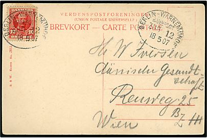 10 øre Fr. VIII på brevkort (Dampfærgen Prins Christian) annulleret med ovalt tysk bureaustempel Berlin - Warnemünde Bahnpost Zug 12 d. 18.5.1907 til Wien, Østrig.