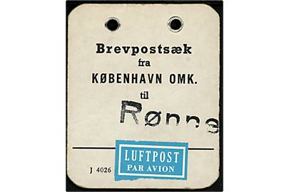 Brevpostsæk mærke - formular J4026 - fra København OMK: til Rønne med luftpostetiket. 