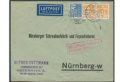 10 øre Bølgelinie (2) og 30 øre Karavel på luftpostbrev stemplet København Luftpost sn1 d. 23.10.1934 til Nürnberg, Tyskland. Tysk luftpost stempel: Mit Luftpost befördert Postamt Nürnberg 2.