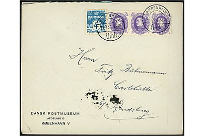 4 øre Bølgelinie og 7 øre Chr. X 60 år i 3-stribe på fortrykt kuvert fra Dansk Postmuseum i København d. 31.7.1931 til Rendsburg, Tyskland.