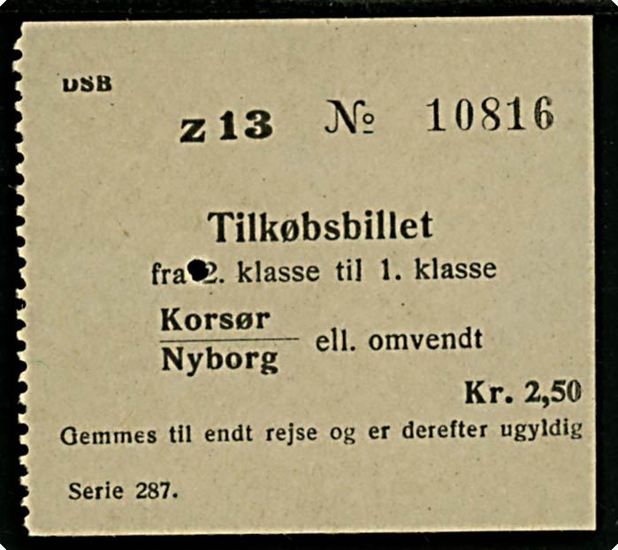 D.S.B. Tilkøbsbillet fra 2. klasse til 1. klasse på Korsør/Nyborg eller omvendt.