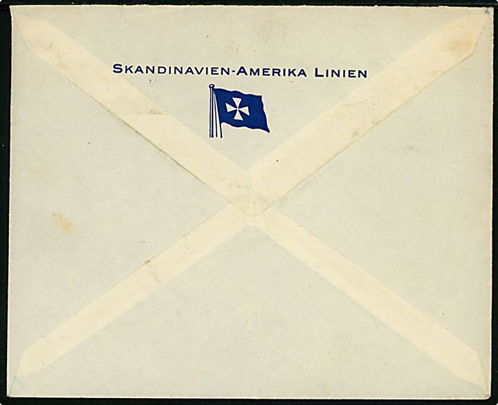 15 øre Karavel på fortrykt kuvert fra Skandinavien Amerika Linie annulleret med norsk stempel i Olso d. 20.7.1935 og sidestemplet Paquebot til København, Danmark.