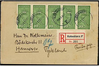 10+5 øre Kræftmærke i vandret 5-stribe på anbefalet korsbånd påskrevet Forretningspapirer fra Kjøbenhavn d. 14.4.1933 til Hannover, Tyskland.